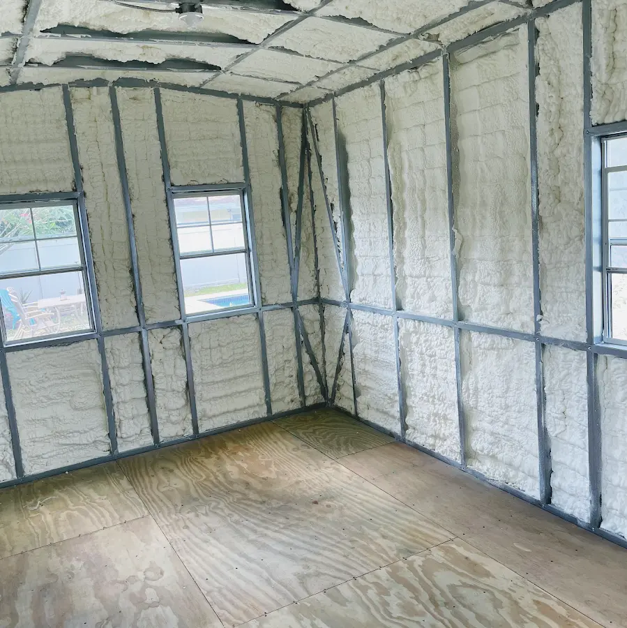 Closed-cell spray foam insulation applied to wall cavities in a residential project in Sutherlin